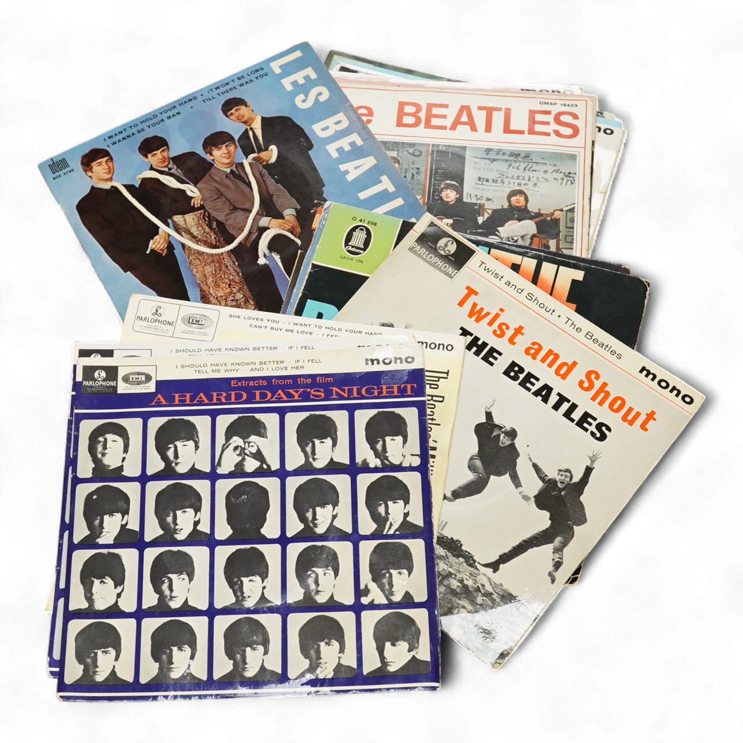 Fifteen The Beatles 7” singles, all in pictures sleeves, including; Extracts from A Hard Days Night, The Beatles Million Sellers, Twist and Shout, Hello Goodbye, Lady Madonna, etc., including several foreign issues